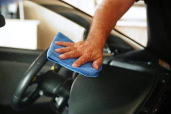 Hand cleaning car windows